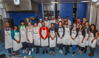 Dr Rupy Aujla with medical students and Westminster Kingsway College students