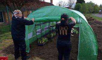 School Kitchen opens garden to help feed children & hungry people 