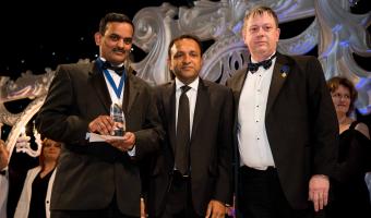 Winner of the SACC competition with sponsor Bioren Parikh and judge Andrew Green