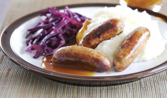 Pork and Garlic Sausages with Goats Cheese Mash and Red Cabbage Saute