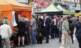 Photo of people buying street food in London