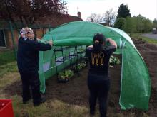 School Kitchen opens garden to help feed children & hungry people 
