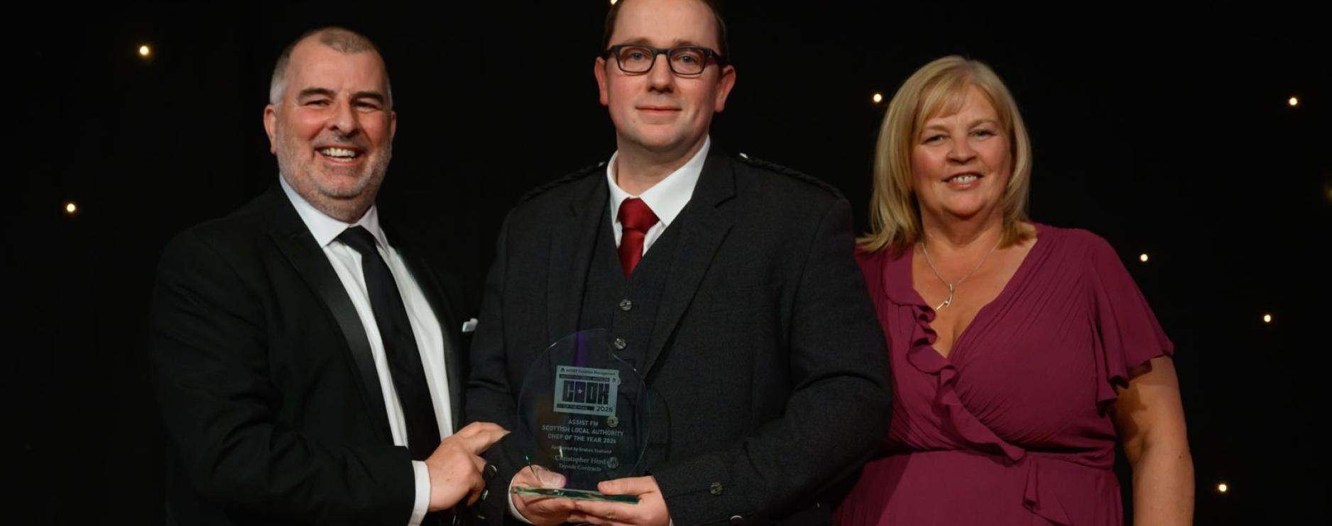 Stephen Murray of sponsor Brakes, Christopher Herd, and Nicky Joiner, chair ASSIST-FM
