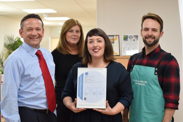 Bartlett Mitchell team receiving the award