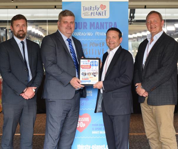 Ian Thomas, CEO Bartlett Mitchell (second from right)