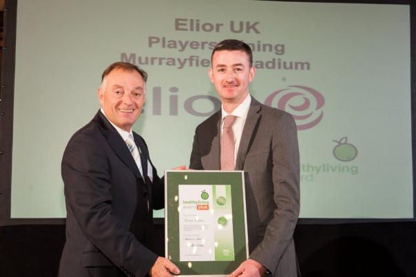 James Nicholson (right) collecting the award