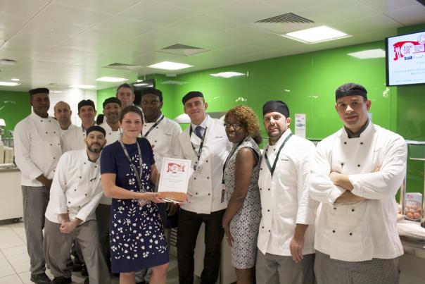 The Soil Association's Lizzi Testani (7th from left) with the John Lewis HQ catering team