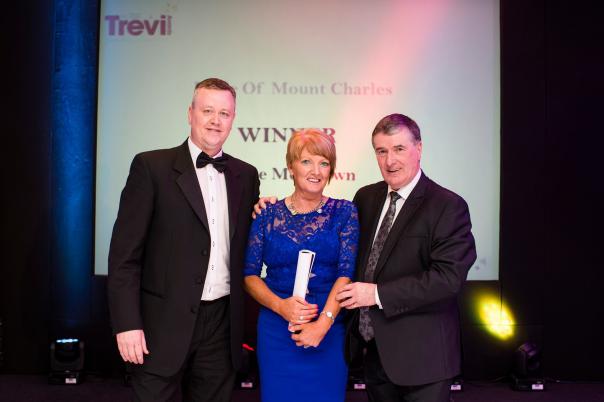 Cathal Geoghegan, Managing Director of Mount Charles and Trevor Annon, Chairman, along with the 'Pride of Mount Charles' award winner Marie McGeown Mount Charles recognises employees at first annual Trevi Awards