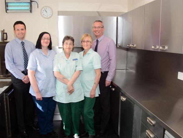 Janet Johnston, Isobel Harvey and Liz McGuire of Strathcarron Hospice with John Wannan, left, and David McPherson of Moffat Moffat manufacture and fit £10,000 kitchen for Scottish hospice free of charge