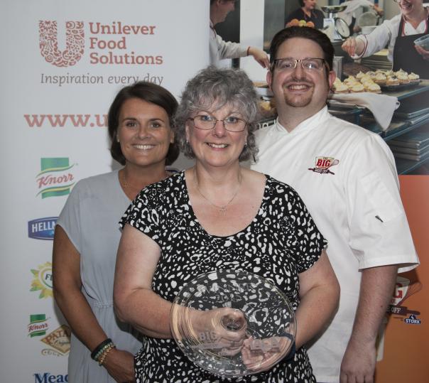 Amanda Barrett with judges Jo Wheatley and Andy Lagor Catering manager Amanda Barrett wins Big School Bake Off