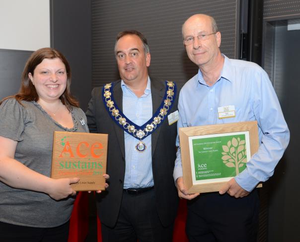 Debbie Rosher and Roger Oliver of Caterers Linen Supply with ACE Chair Ruston Toms