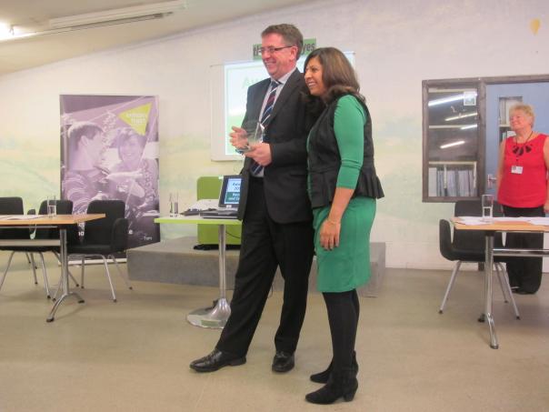 Aramark's Ian Nuttal with ITV Meridian news presenter Sangeeta Bhabra Aramark awarded support disadvantaged people
