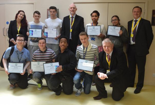 Harrison and Springboard representatives presented certificates to the eight Carshalton College students who completed the work experience programme Harrison work experience exceeds expectations
