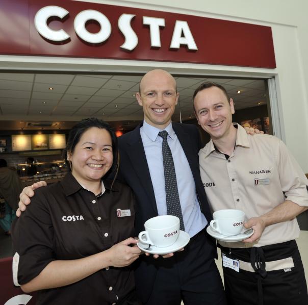 Matt Dawson with Costa staff at the opening