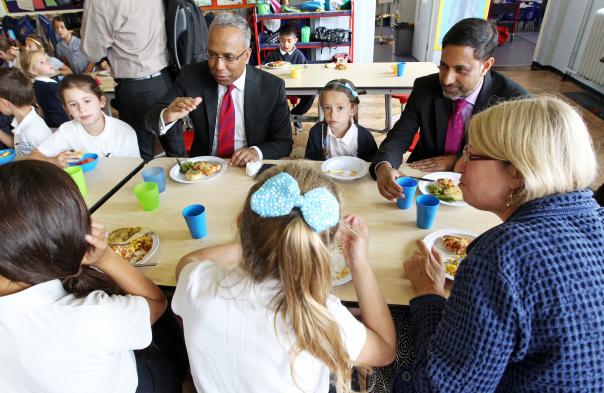 Mayor Lutfur Rahman joins Chisenhale pupils, headteacher Helen James and Cllr Gulam Robbani London Borough of Tower Hamlets free school meals
