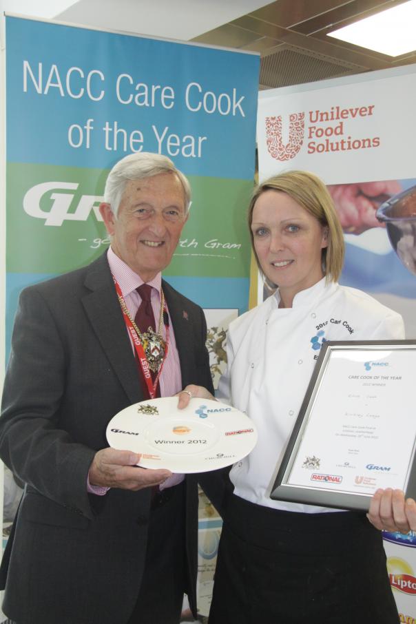 2012 Care Cook of the Year Ellie Cook with Geoffrey Osbourne of the Worshipful Company of Cooks