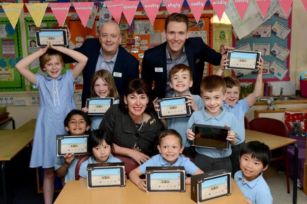 Perry Manor home manager Mike Dearn with customer relations manager Ben Walker, Perry Wood Primary School head teacher Tracy Kelly-Freer and pupils who attend the school’s breakfast club. Perry Manor care home provides treat for primary school breakfast club