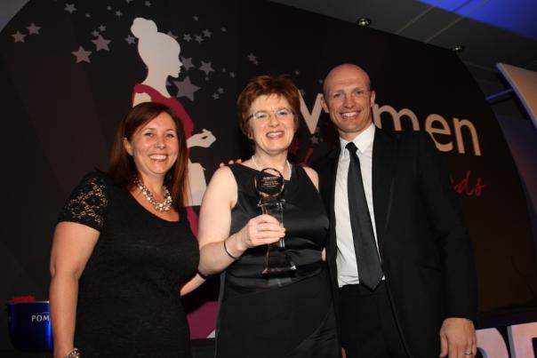 Margot Slattery of Sodexo, Woman of the Year Award winner, with host Matt Dawson and Stephanie McCormack of sponsor Merlin Entertainment