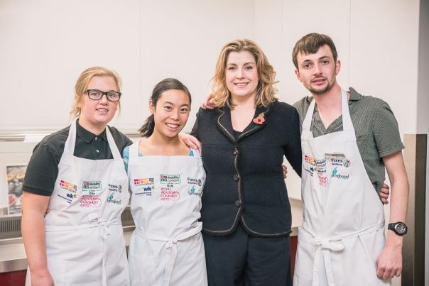 Penny Mordaunt with the food service team