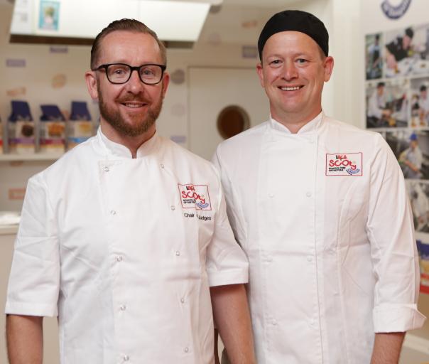 (L-R) Lead judge Mark Rigby with 2018 winner, Michael Goulston