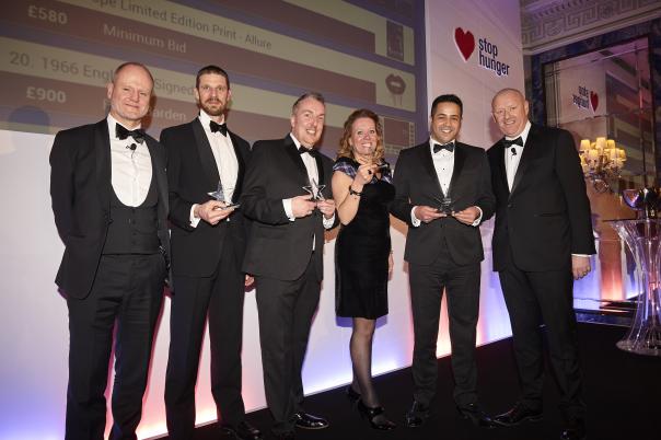 Sean Haley, regional chair of Sodexo UK and Ireland with the Stop Hunger Charity winners