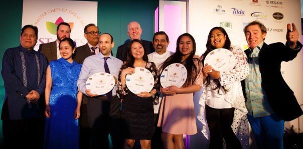 The winning UWL team with their tutor, judges and host Nigel Barden Zest Quest Asia 2019 final University of West London
