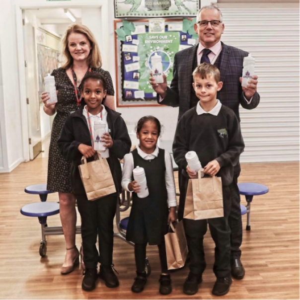 Michael Hales, managing director of Juniper Ventures along with Grainne Sheehy from The Education Space with pupils of Central Park School in East Ham
